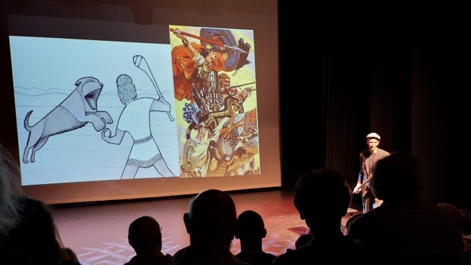 <p>Mike McCarthy presenting <i>Who Shot Queen Medb?</i></p>