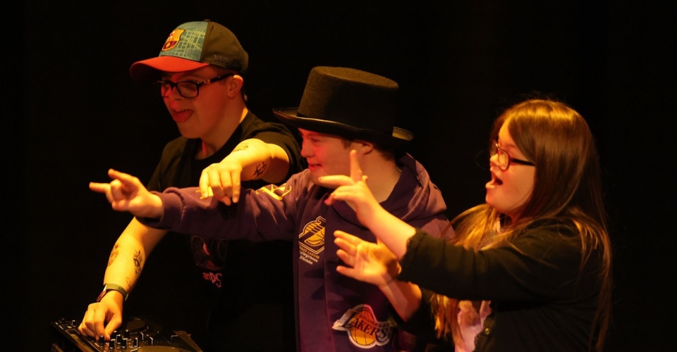<p>Members of Bright Sparks perform at The Dock for World Down Syndrome Day 2025.</p>